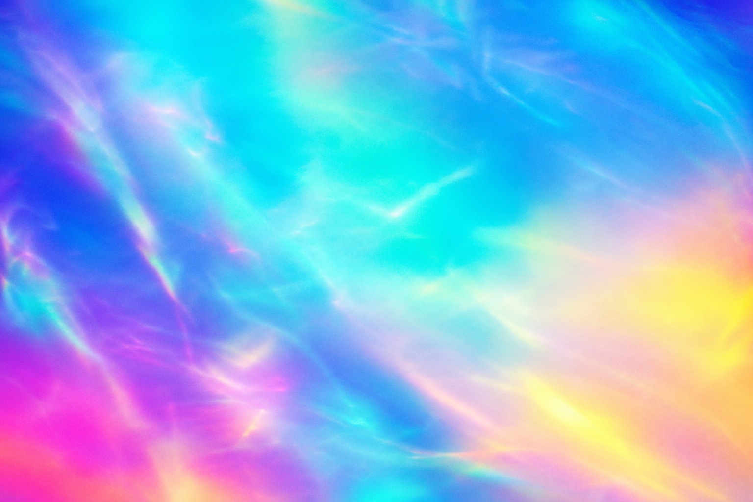 Soft cyan, pink, yellow, and blue prismatic light streaks with a glowing abstract haze.