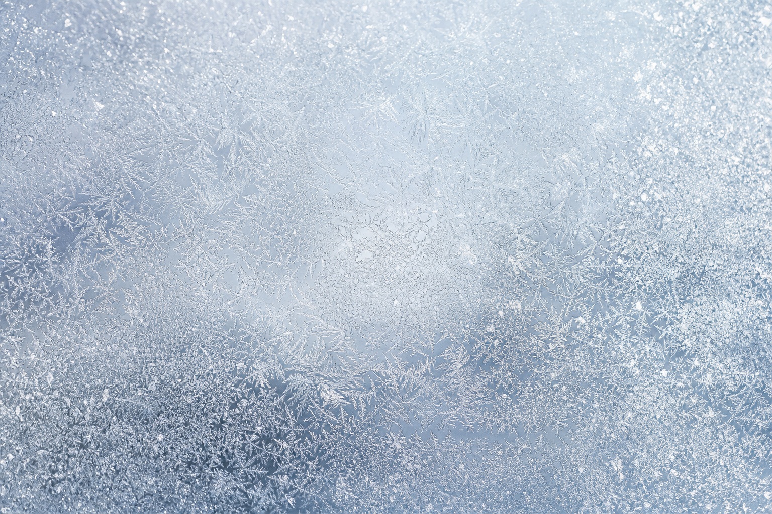 Light blue sparkled frosted glass texture with a soft etched surface