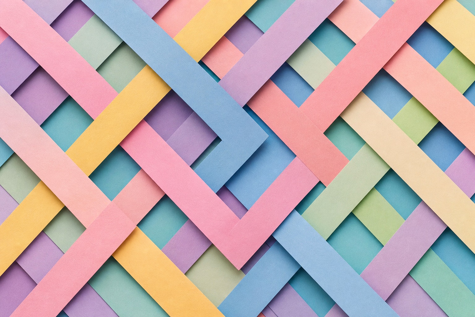 Pastel paper strips woven into a colorful geometric lattice pattern