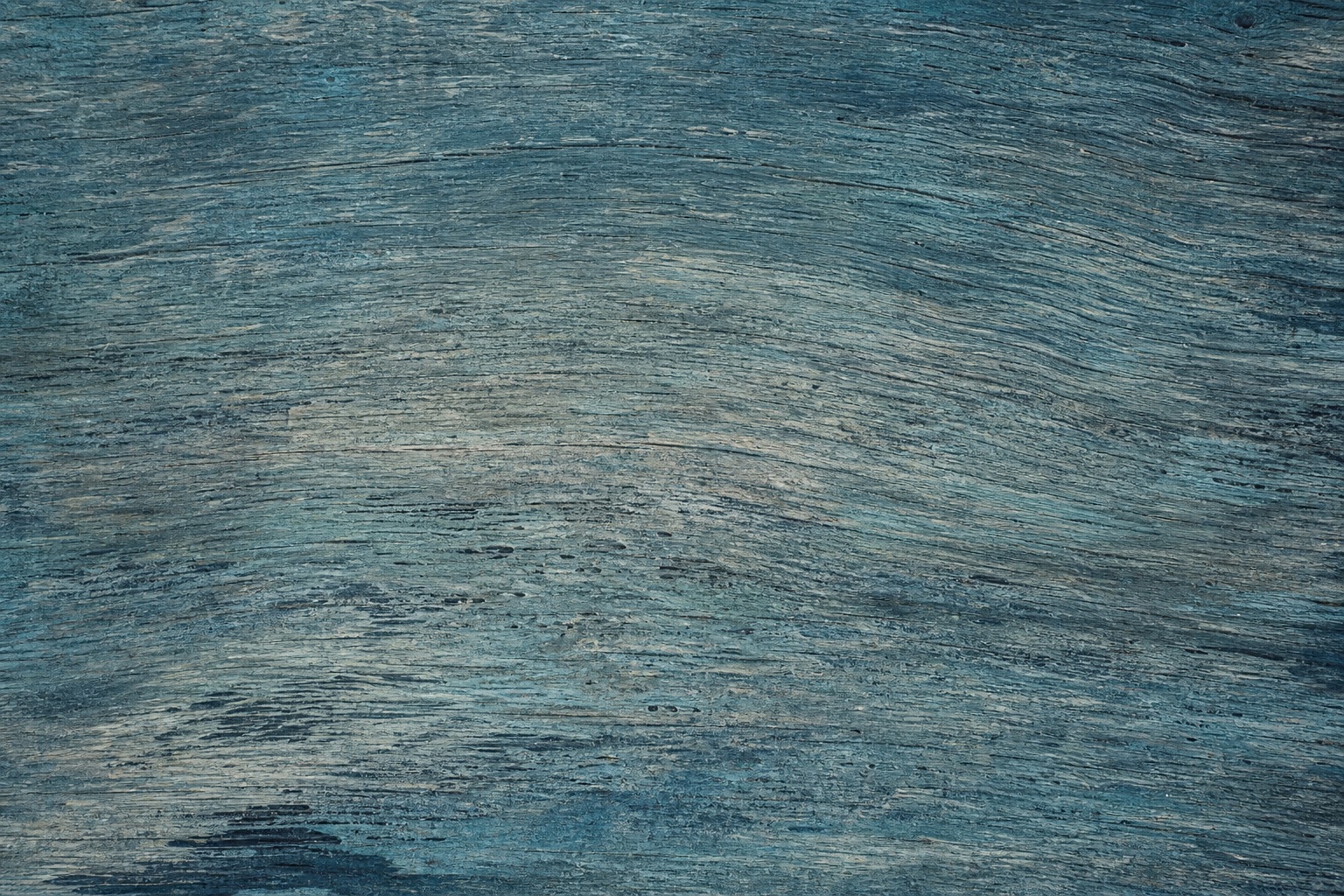 Slate cyan weathered grain texture with a softly worn, horizontal surface pattern.
