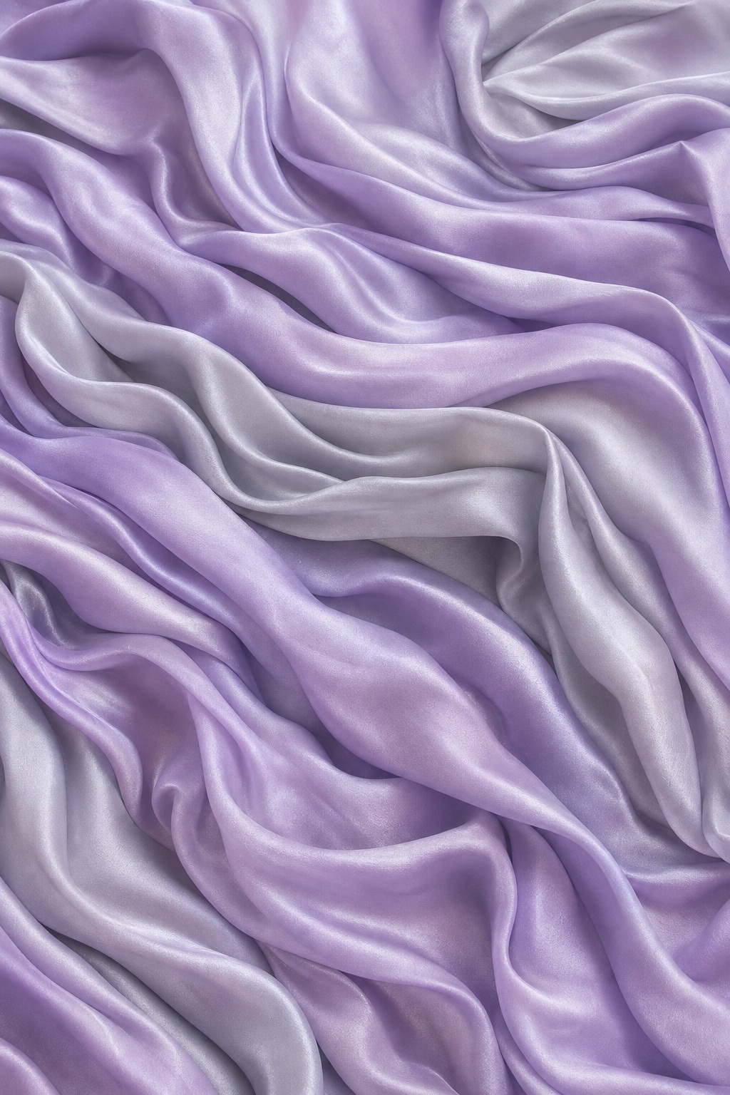 Lilac and silver silk fabric with soft gathered folds and rippling texture