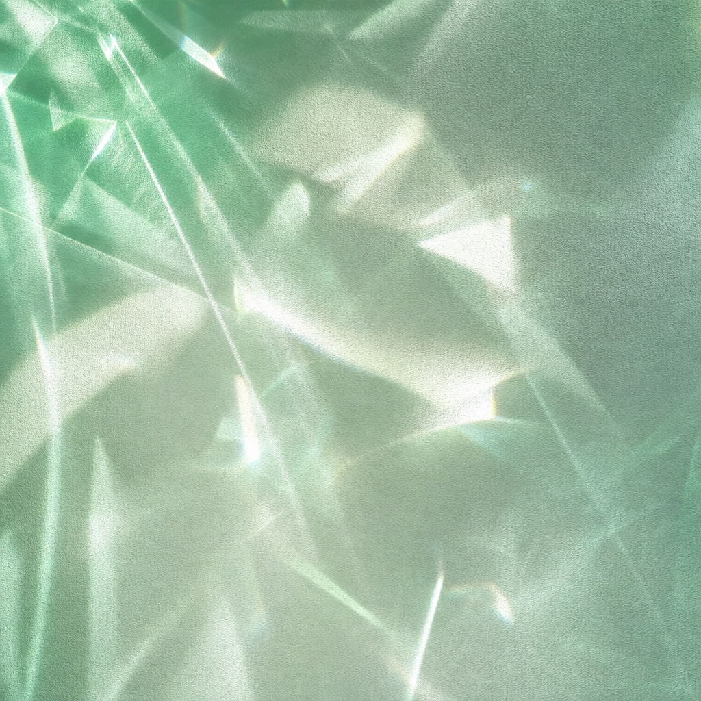 Green abstract light refraction pattern with soft shadows and prismatic highlights