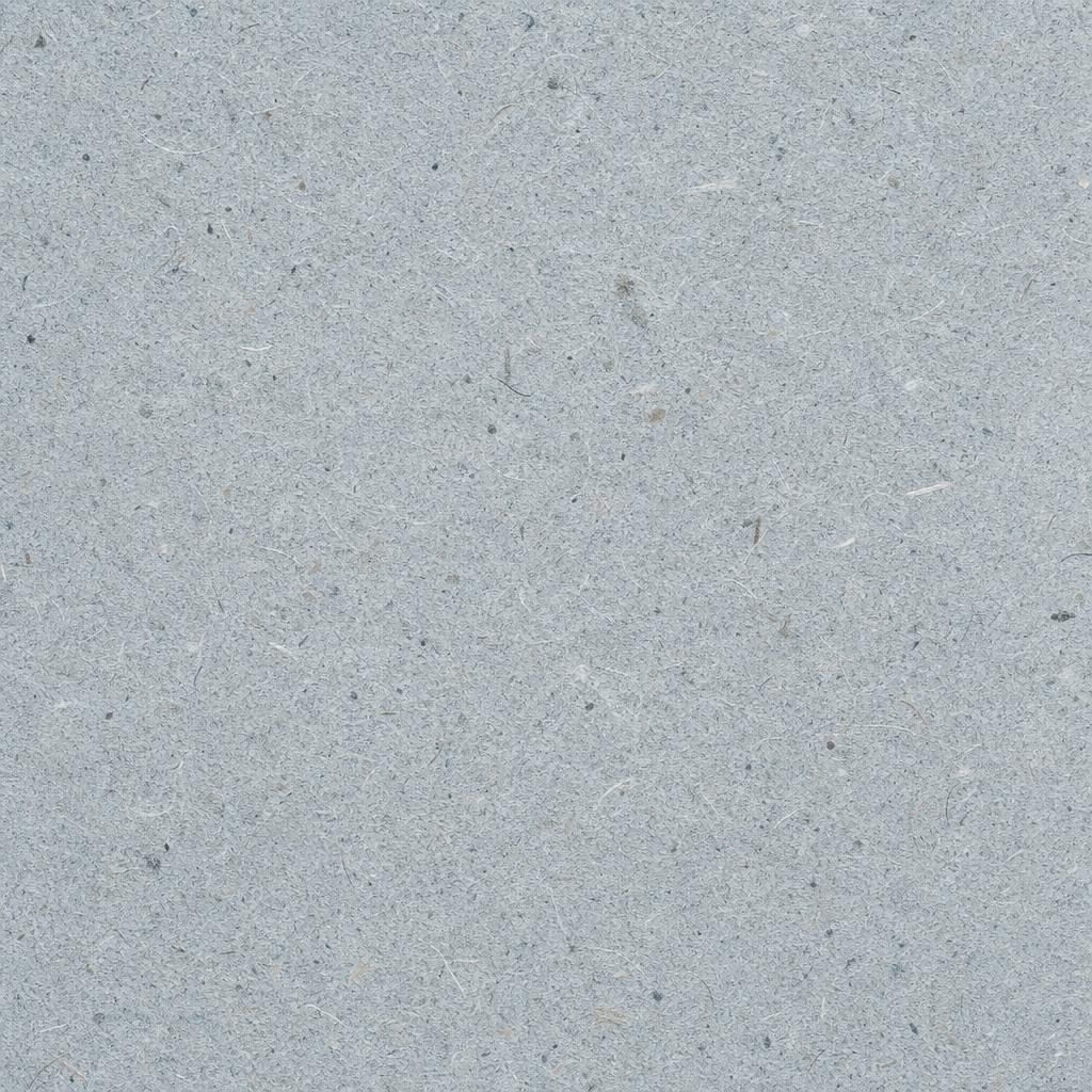 Light gray recycled paper texture with fine fiber speckles