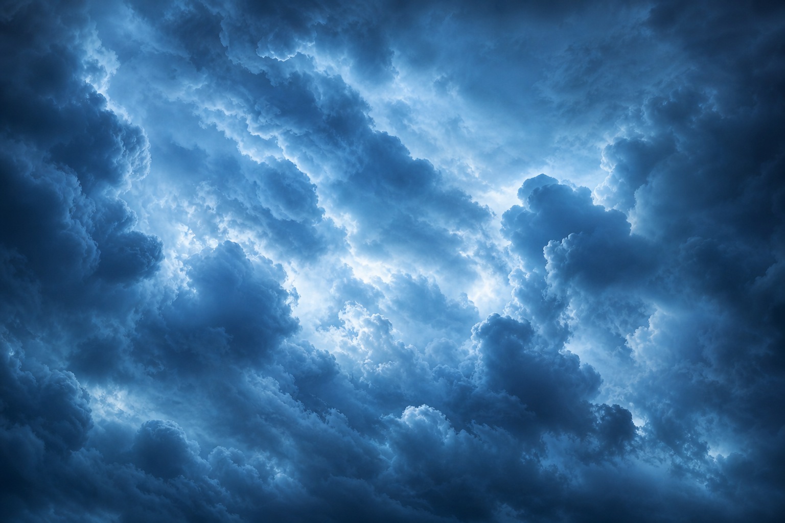 Dark blue-gray storm clouds filling the sky with a dramatic atmospheric look.