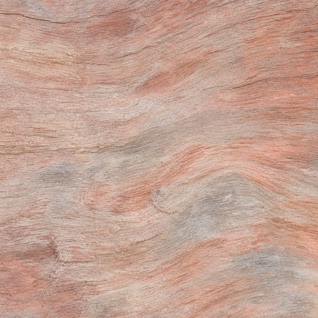 Soft coral weathered grain texture with layered streaks and a worn surface