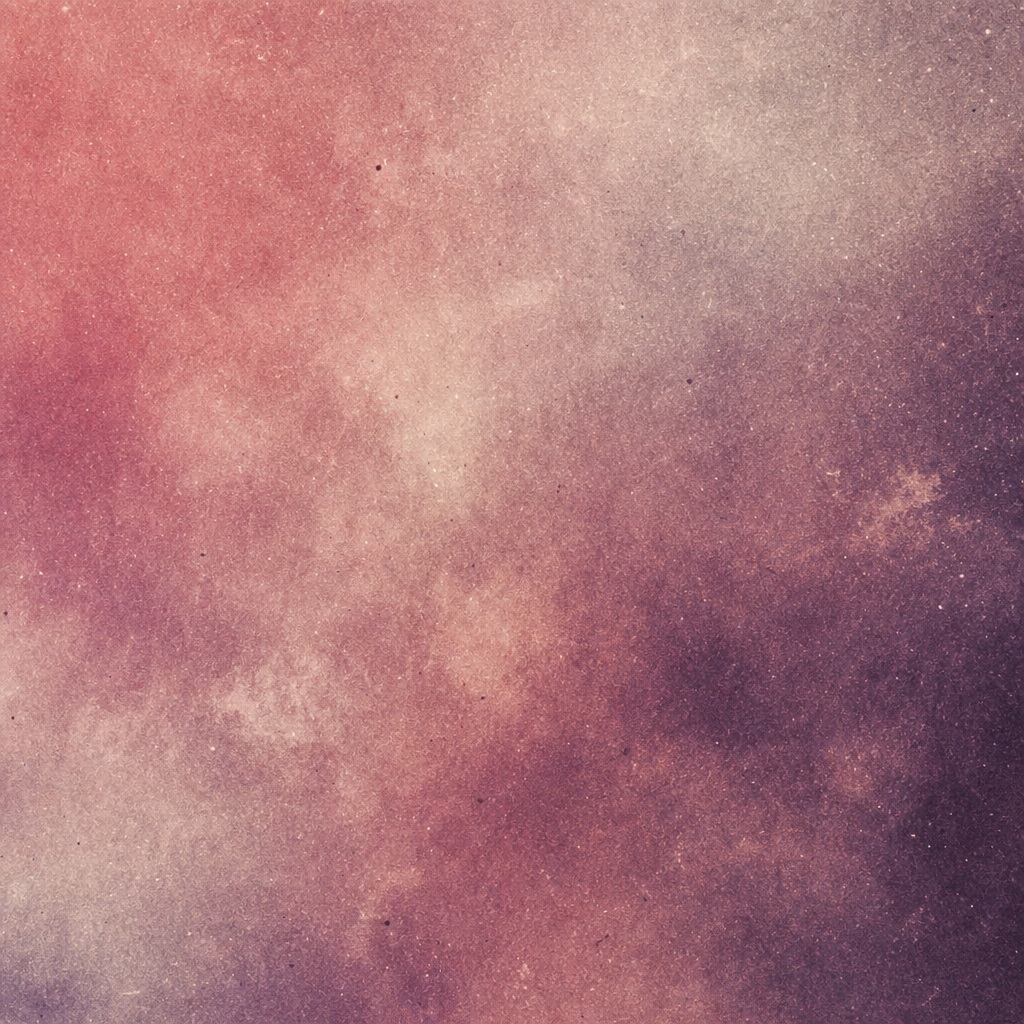 Soft faded rose and beige abstract texture with visible film grain and haze