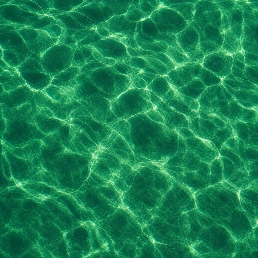 Green abstract surface with bright caustic light patterns and soft refraction lines
