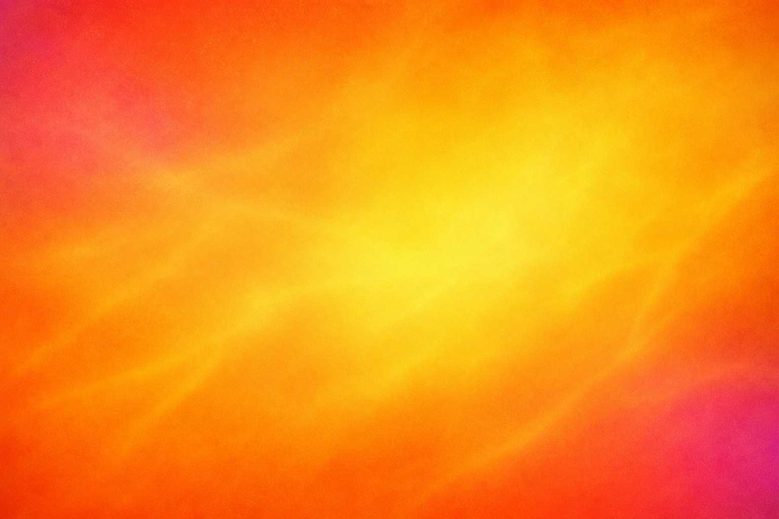 Warm orange abstract gradient with bright yellow glow and pink edges