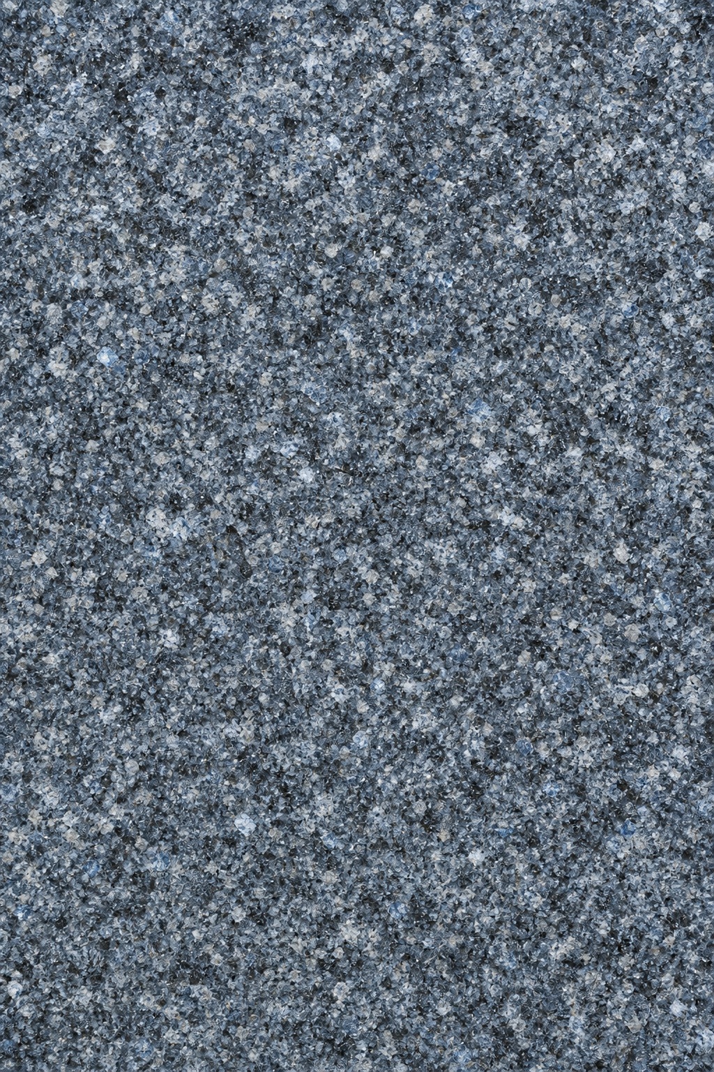 Blue gray granite surface with fine speckled mineral grain texture