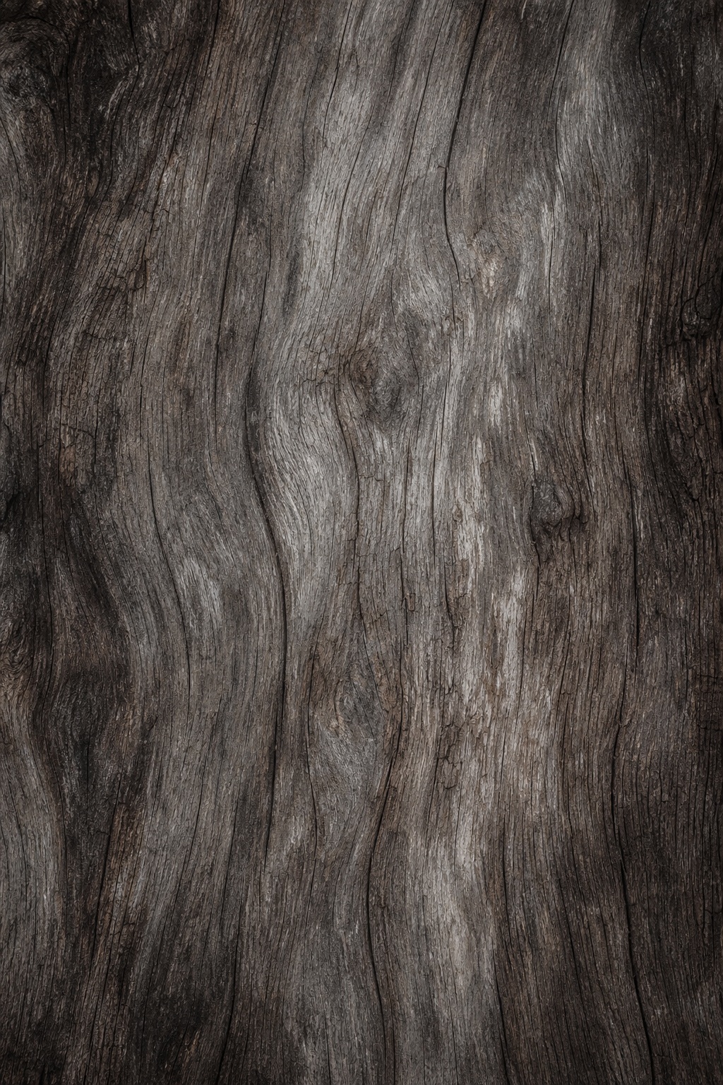 Vertical weathered reclaimed wood texture with gray and charcoal brown grain