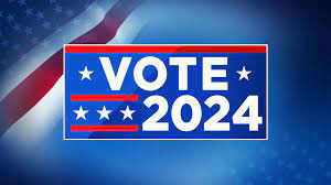 Blue background with a Vote 2024 sign, stars, and campaign-style graphics.
