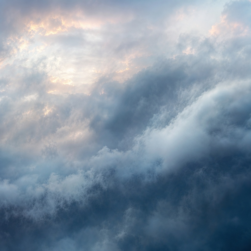 Soft blue-gray clouds and mist swirling across a square alpine sky background.