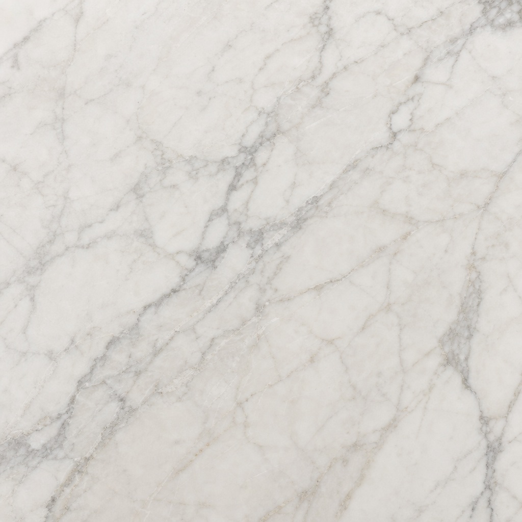 White marble stone surface with soft gray veins and a neutral light texture.