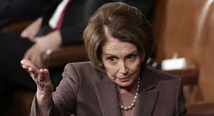 Nancy Pelosi speaking in a formal setting