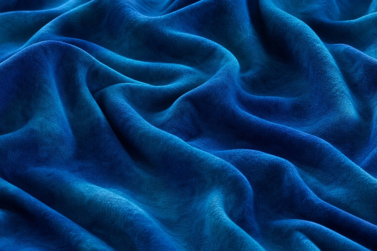 Cobalt teal fabric with soft folded valleys and brushed texture.