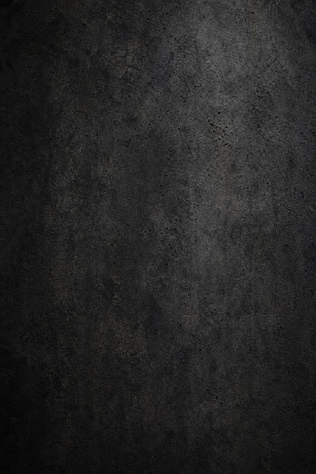 Vertical dark gray concrete texture with a rough, neutral surface