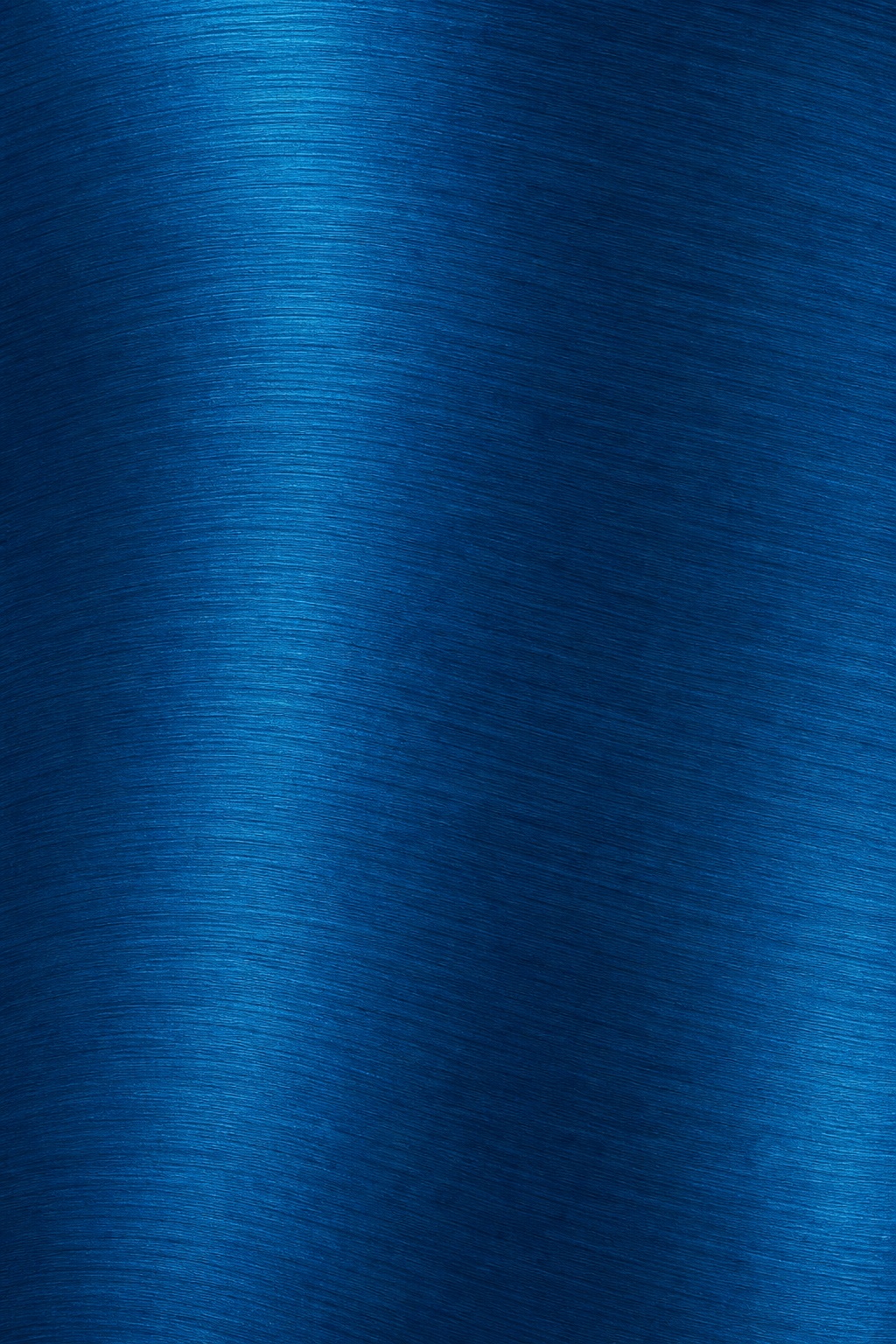 Blue brushed metal texture with soft wave grain and a metallic surface