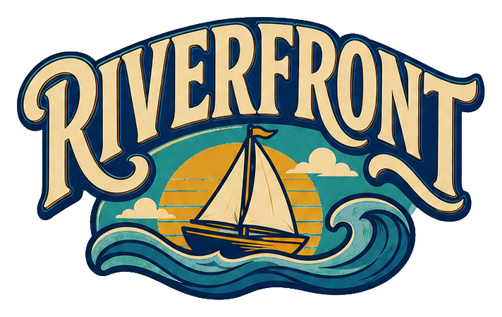 Retro Riverfront text with a sailboat sailing over stylized blue waves.