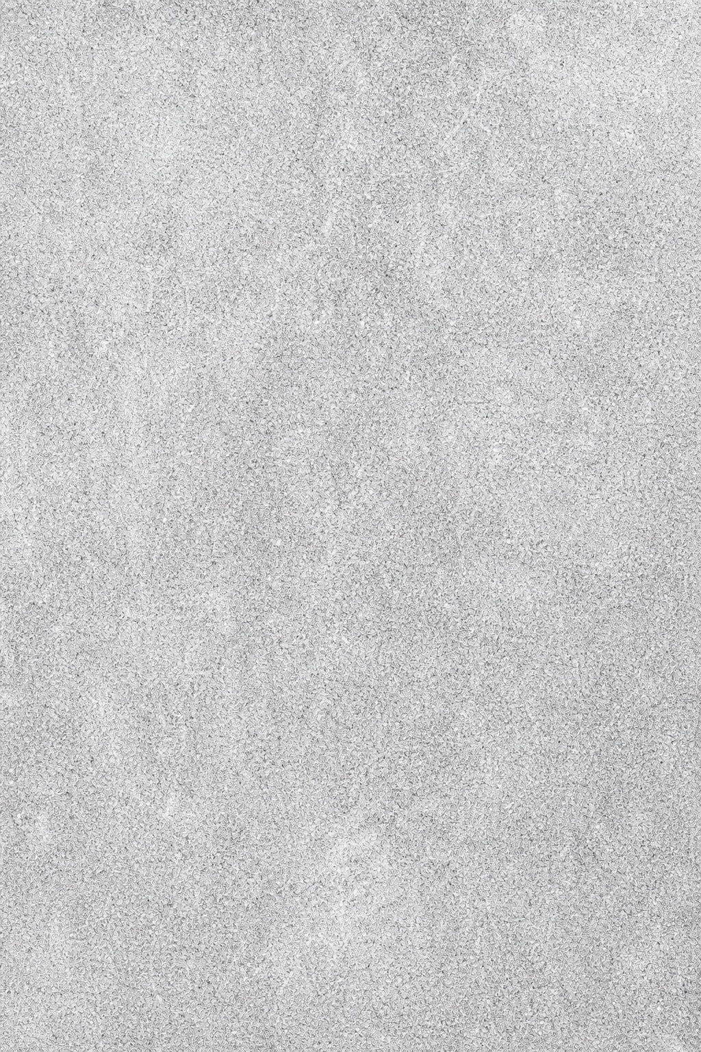 Light silver grain texture with soft speckled noise across the surface