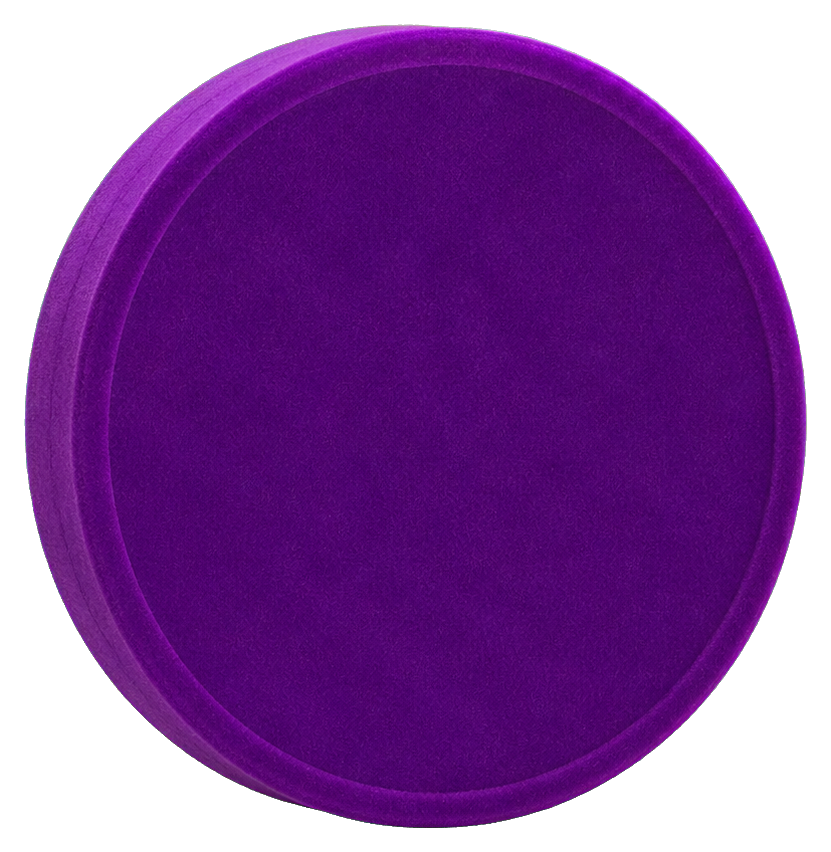 Purple circular velvet theater token with a blank center and soft textured edge.