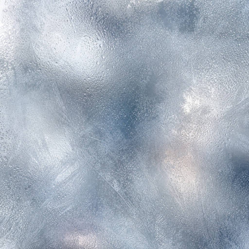 Abstract frosted glass texture with soft cloudy blue-gray surface patterns