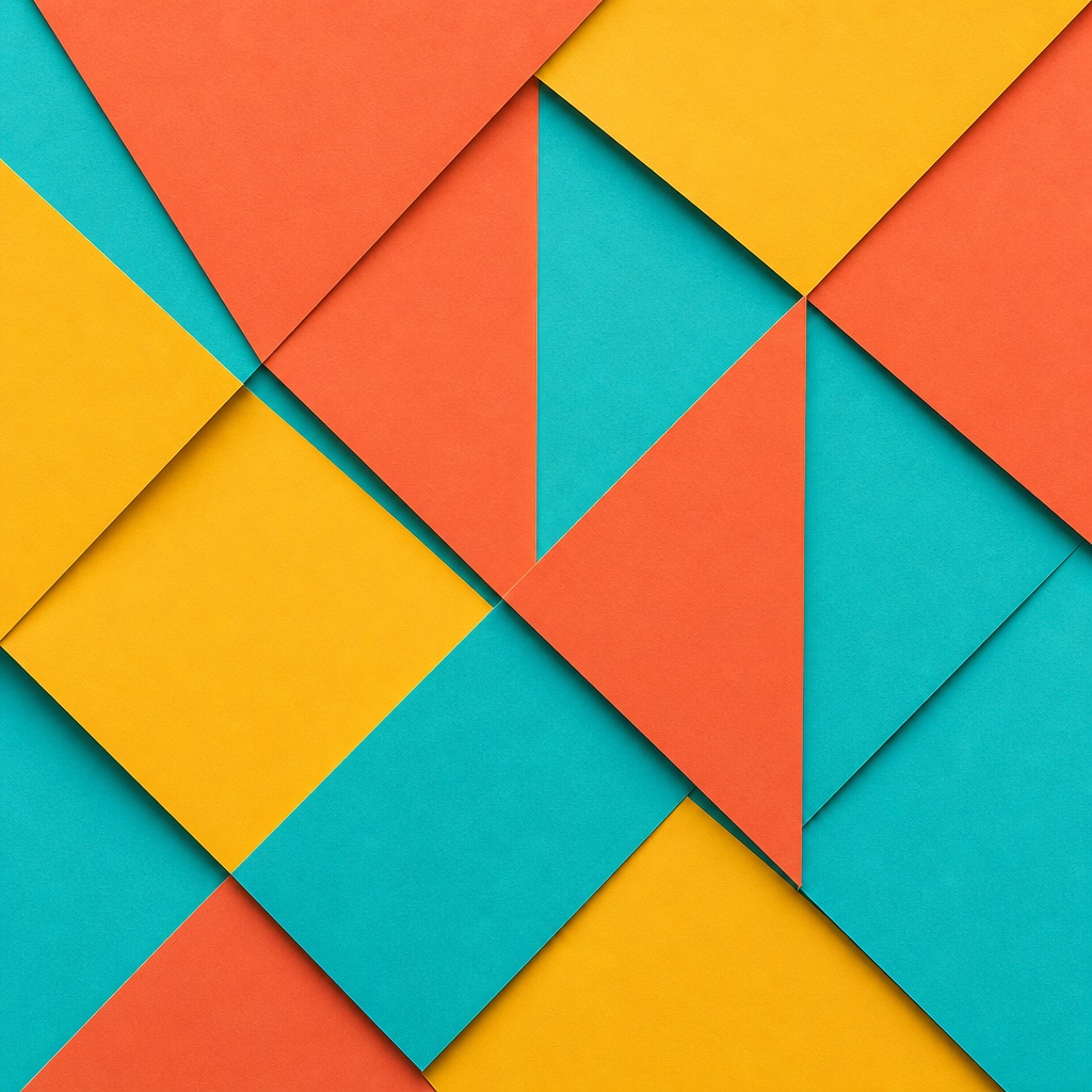Colorful folded paper shapes forming a geometric grid in citrus tones.
