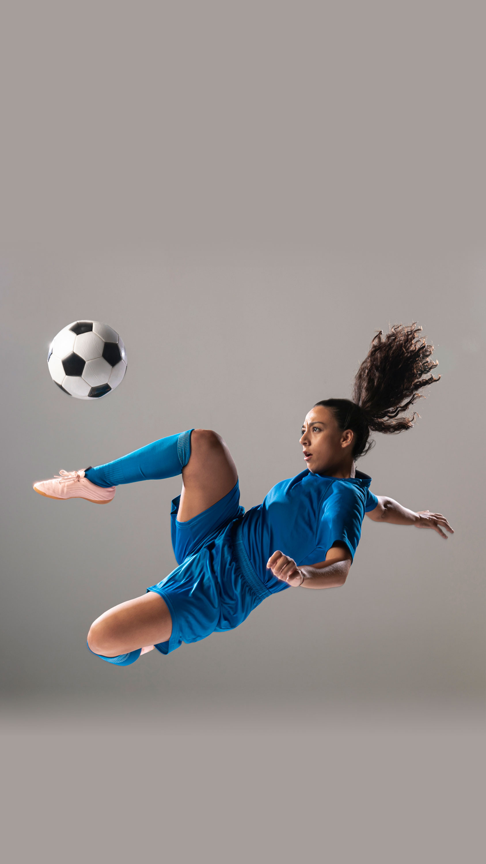 Preview for Female-soccer-player-action-shot-background-6e4cb
