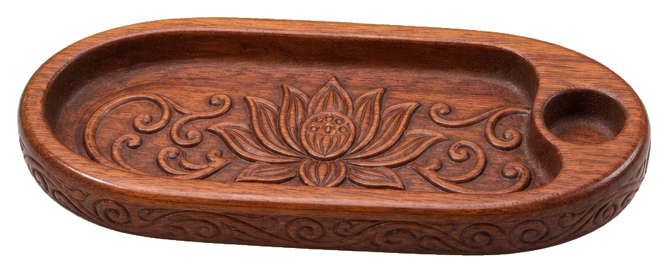 Carved oval wooden incense holder with decorative floral engraving and two round openings