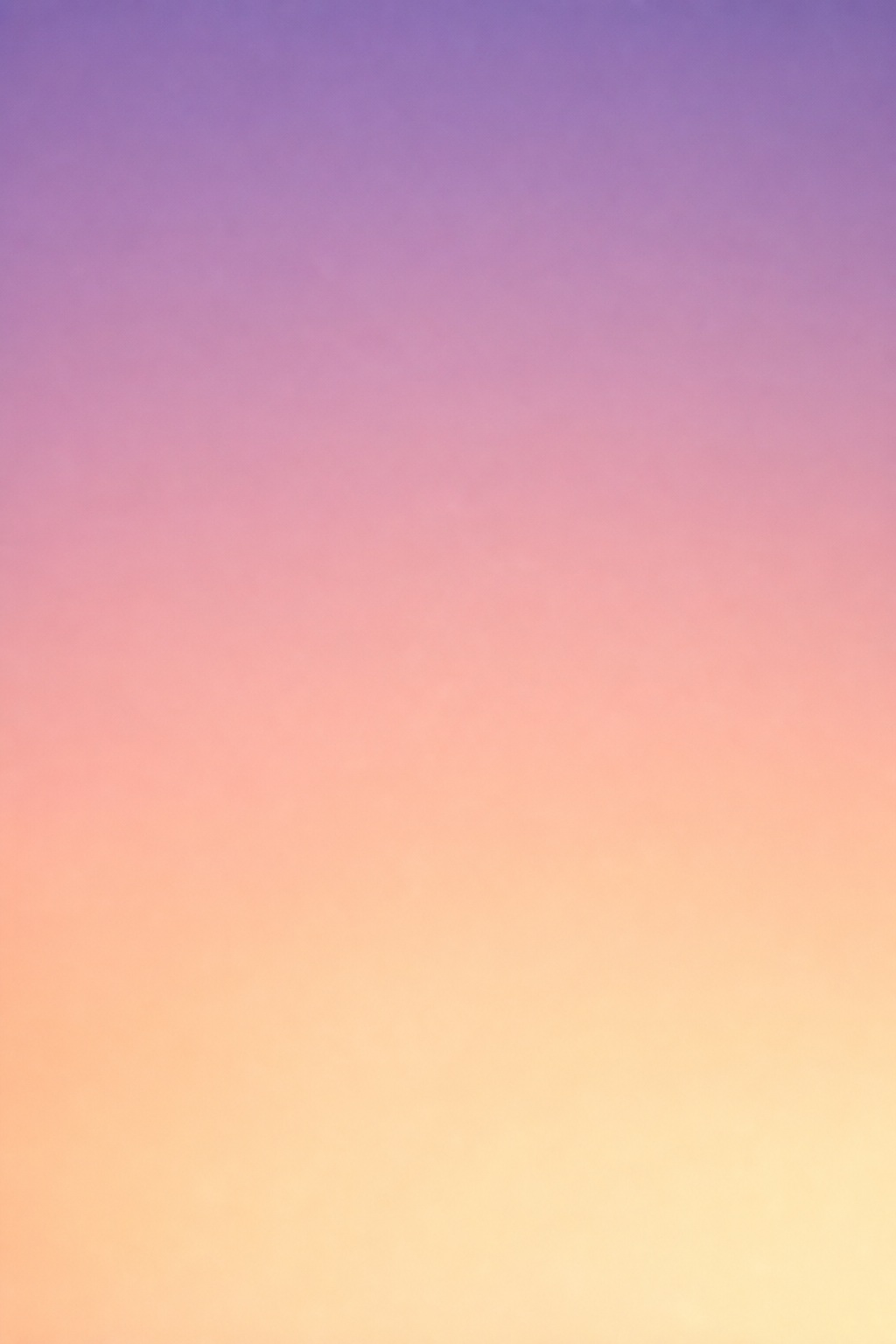Vertical pastel gradient fading from lavender at the top to peach and cream below.