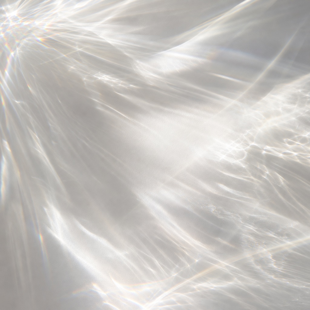 Soft abstract white light patterns with prismatic glass-like refraction shadows.