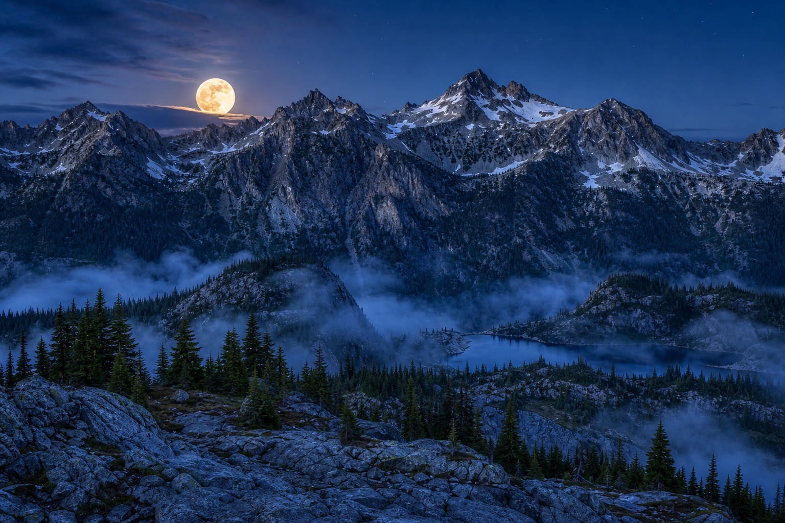 Moonlit mountain range above pine-covered ridges and misty valleys at night