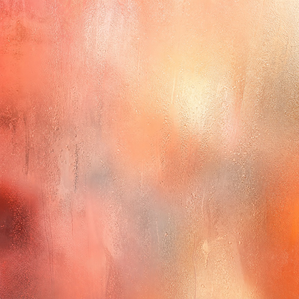 Abstract coral frosted glass texture with soft misty streaks and blurred surface detail