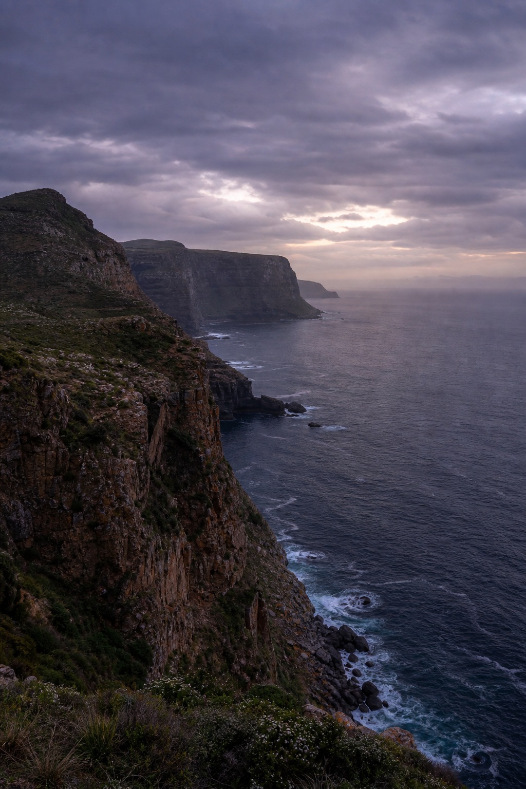 Preview for Cloudy Dusk Coastal Cliffs Background