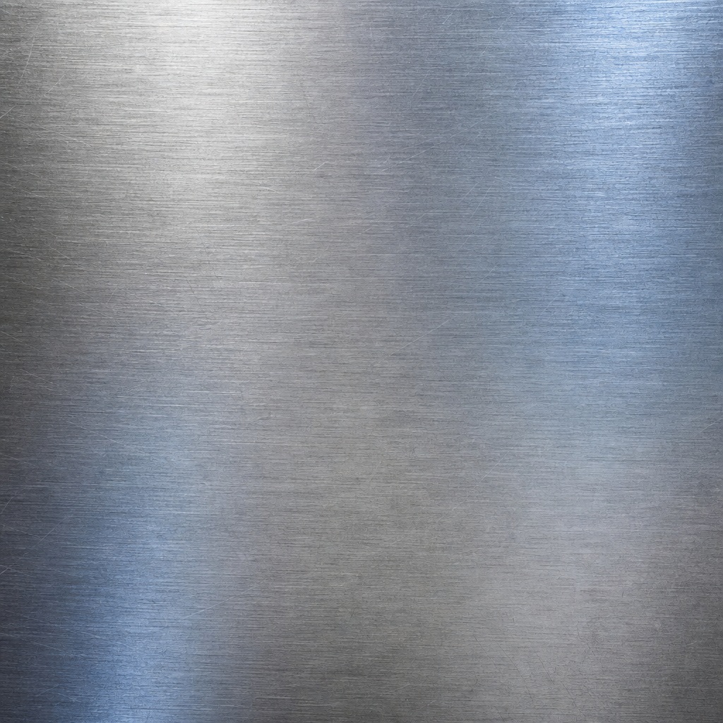 Brushed titanium metal surface with a soft satin texture and vertical sheen