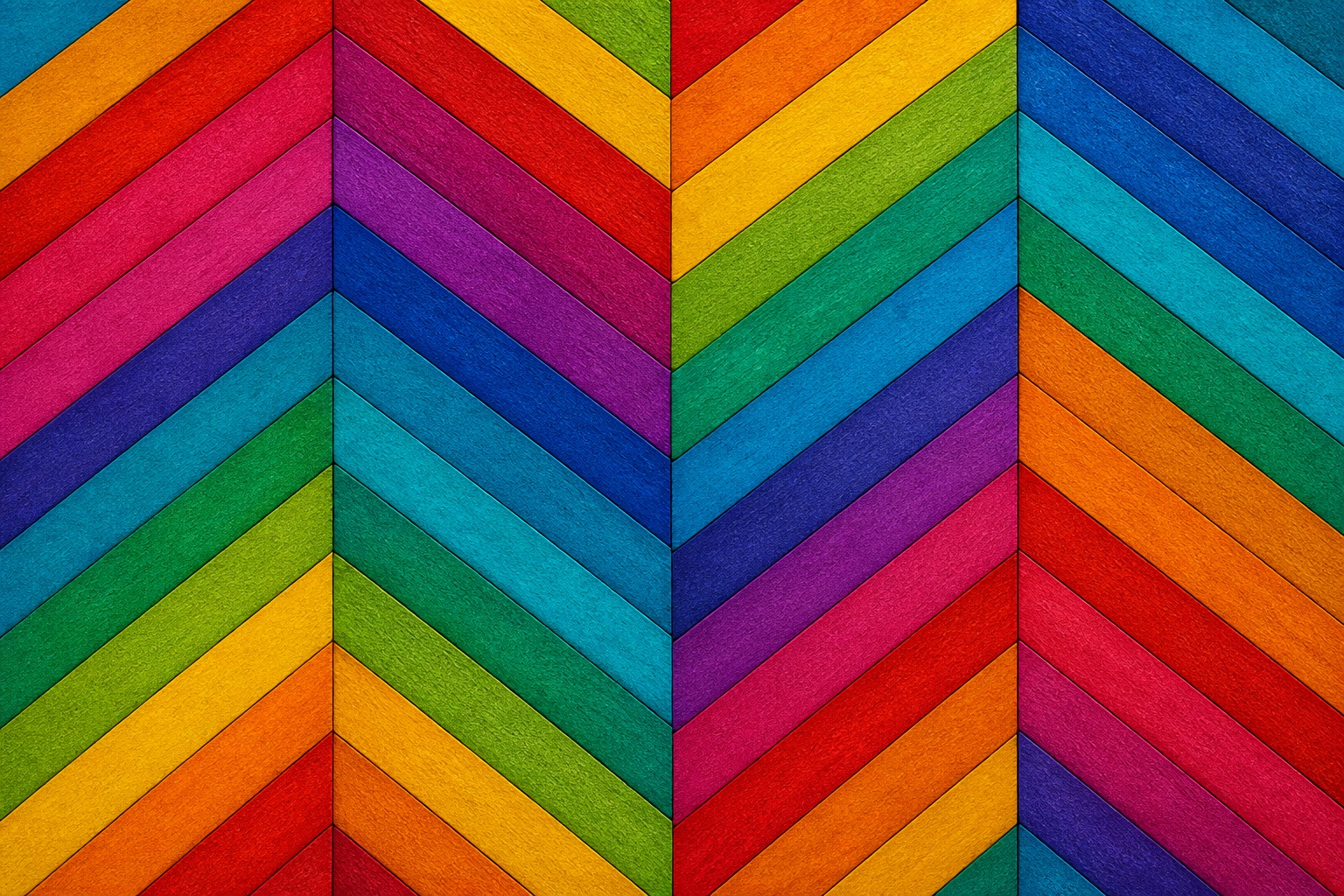 Bright rainbow herringbone pattern with diagonal geometric stripes in multiple colors.