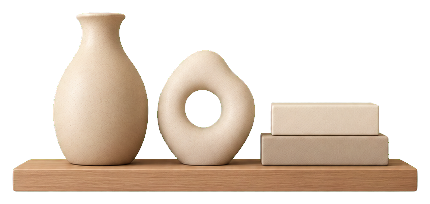 Minimal shelf decor with a vase, ring accent, and stacked books on a wooden shelf.