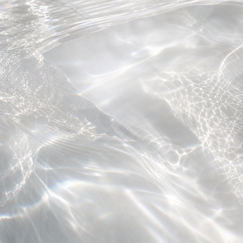 Soft abstract white light caustics and glass refraction patterns on a pale background