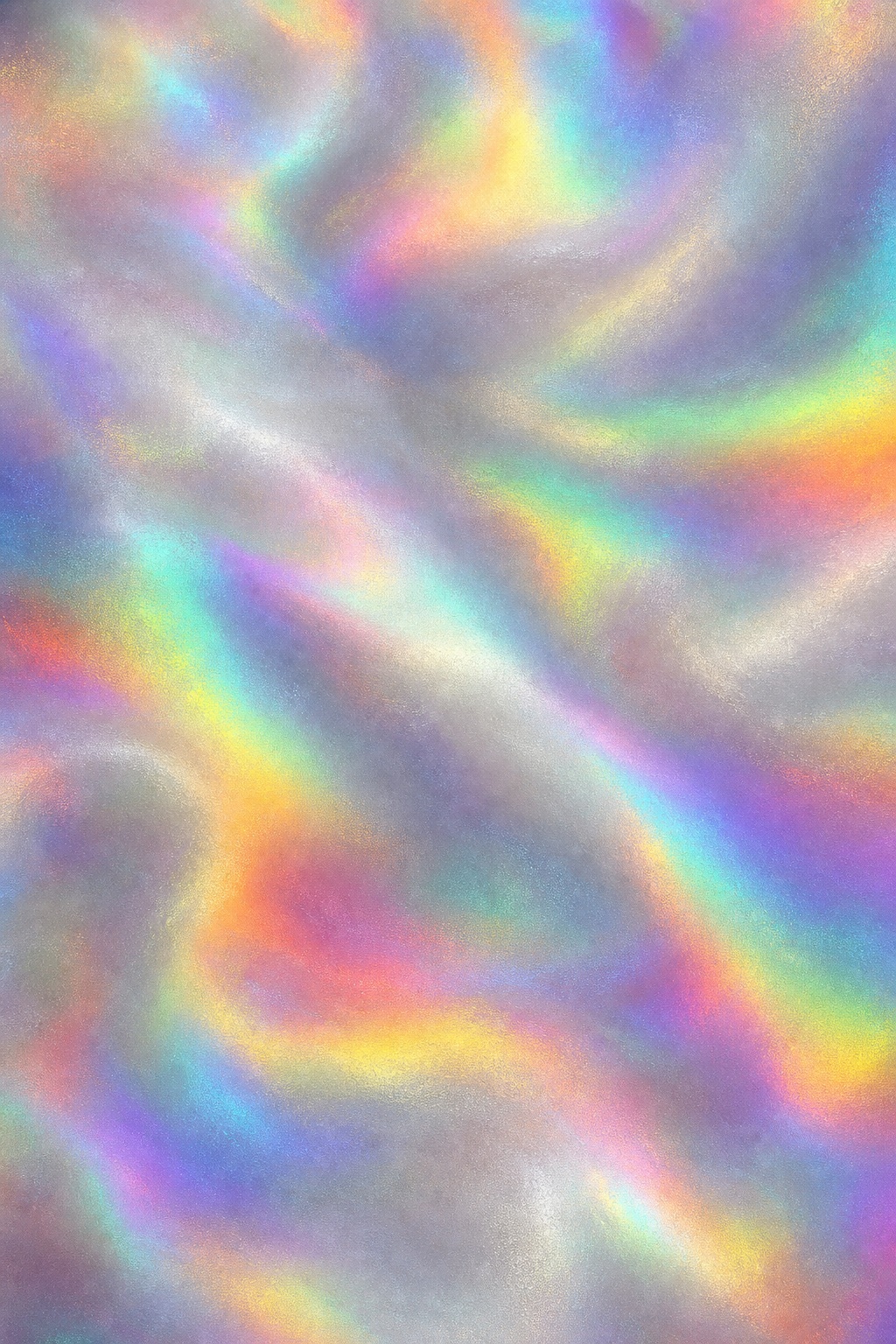 Soft silver rainbow iridescent folds with flowing holographic color shifts