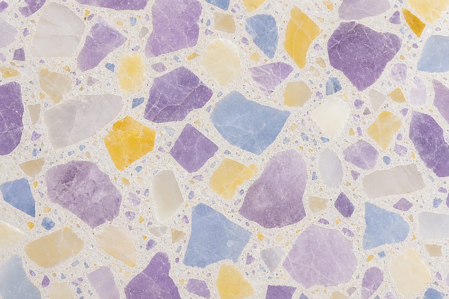 Lavender and yellow terrazzo background with large colorful mineral chips.