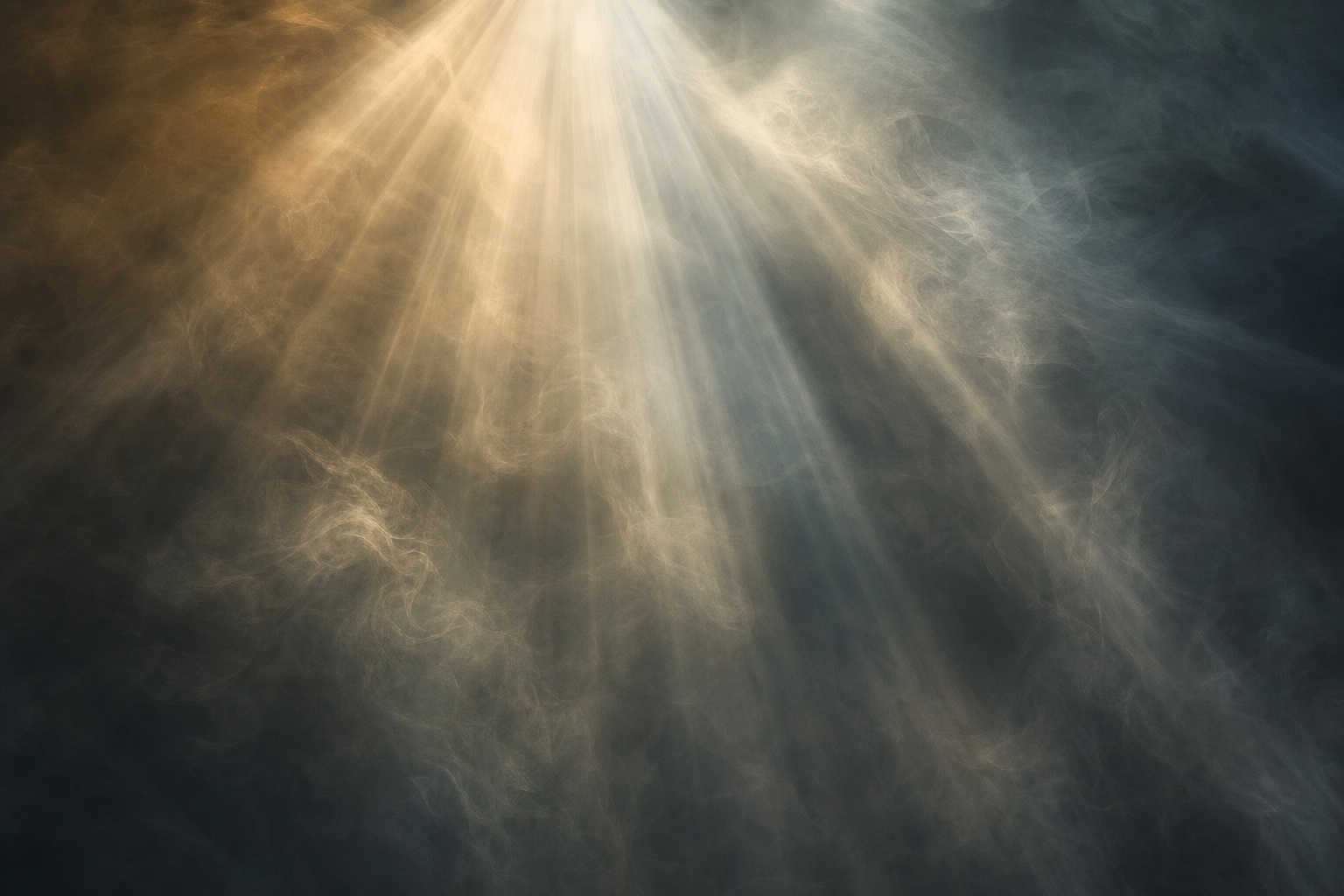 Soft golden light rays shining through smoky dark atmosphere