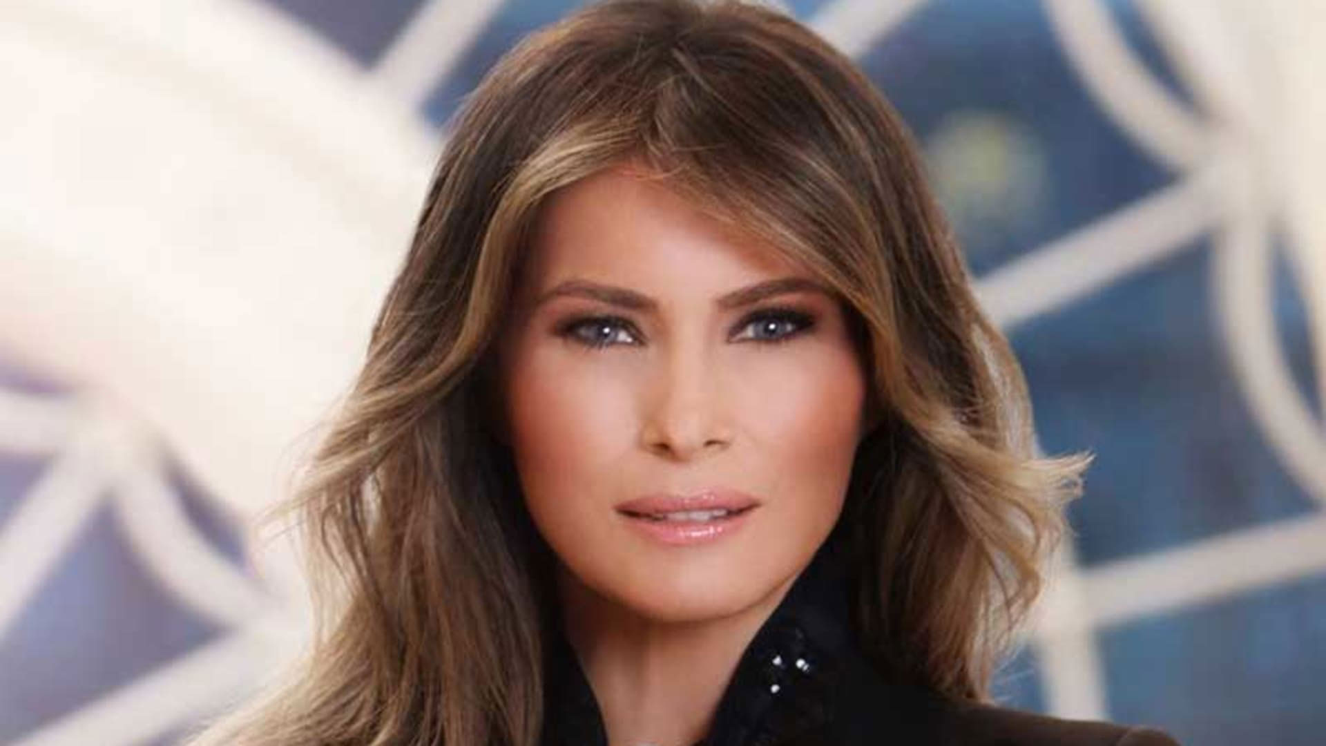 Melania Trump in a black collared shirt