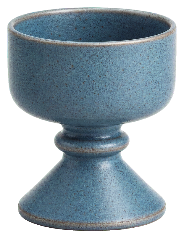Dusty blue textured candle holder with a rounded cup and pedestal base