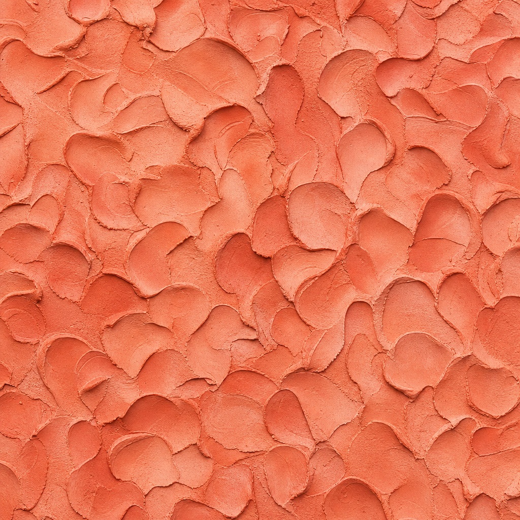 Matte coral clay texture with overlapping sculptural scalloped shapes.