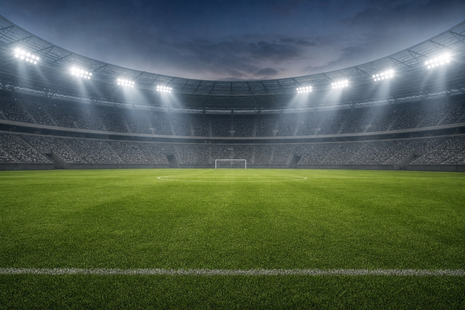 Empty soccer stadium with bright lights over green turf