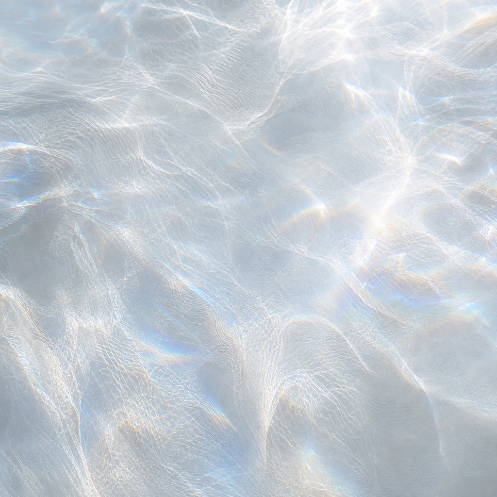 Soft silver white abstract light reflections across a diffuse glass surface