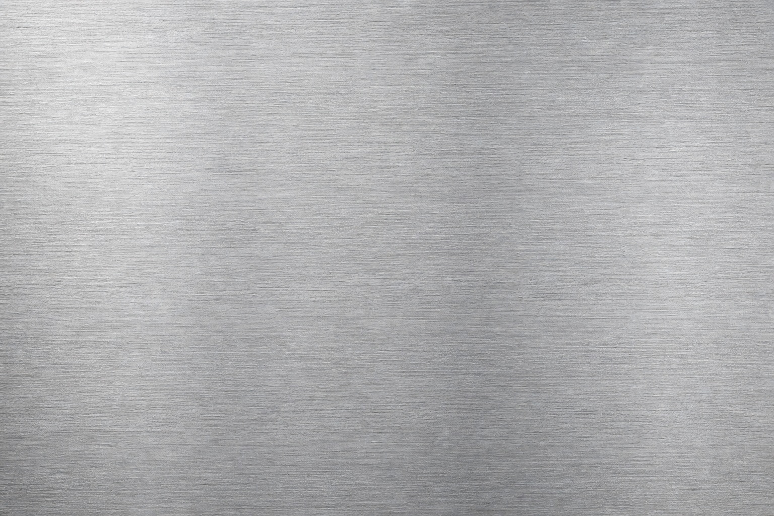 Brushed silver metal surface with fine horizontal grain and subtle texture