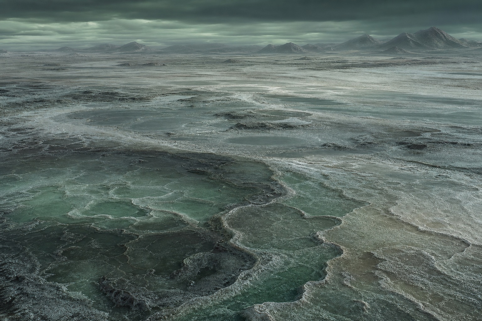 Layered salt basin landscape with dark ridges and jade-toned twilight across a distant desert