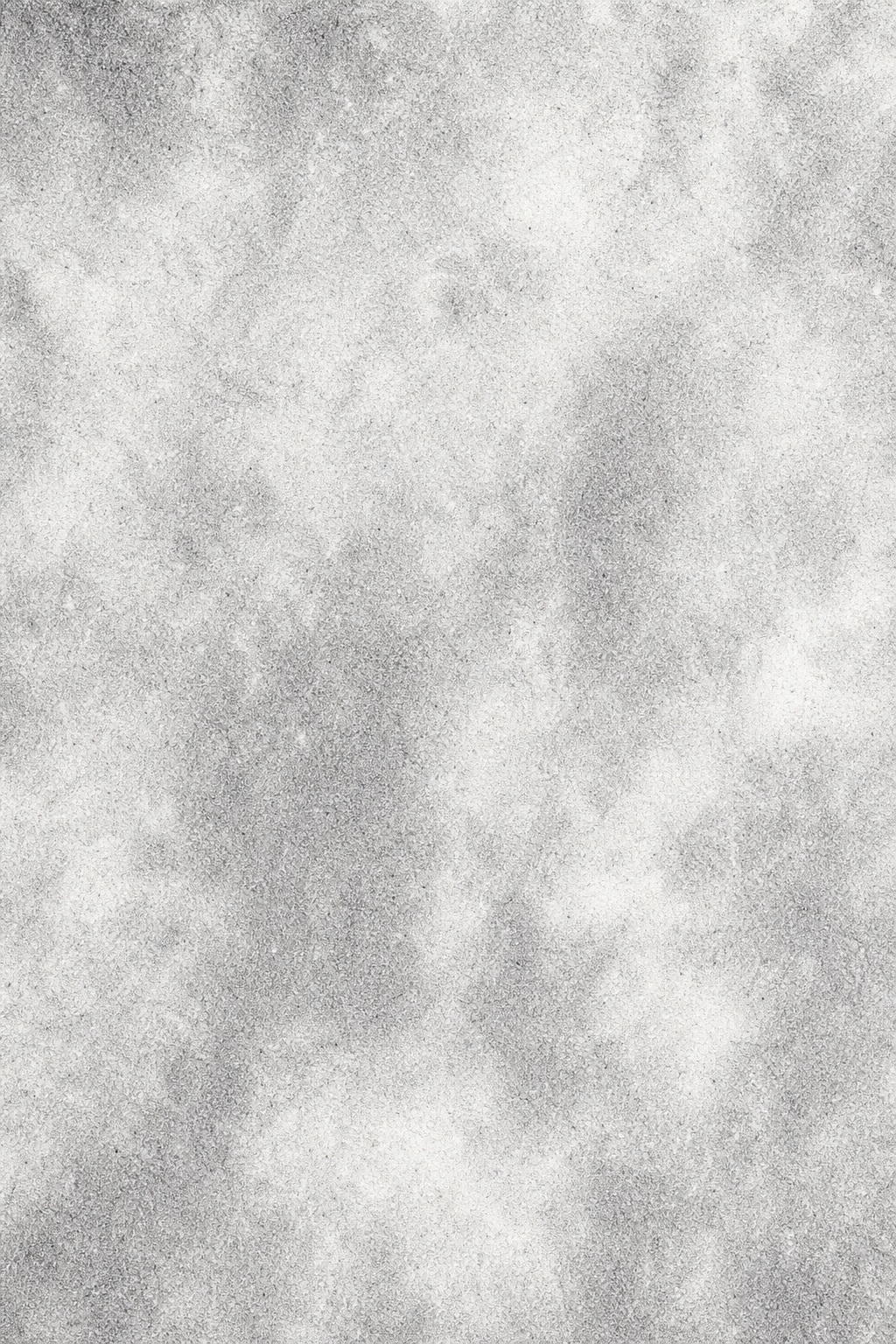 Soft silver-gray film grain texture with cloudy, cloudy light patches.