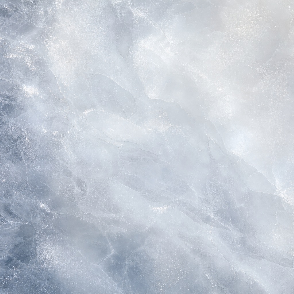 Soft frosted ice texture with pale blue and white crystalline surface
