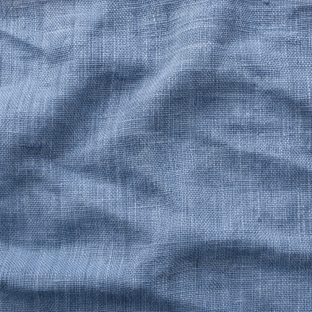 Blue-gray linen fabric texture with visible woven threads and soft wrinkles